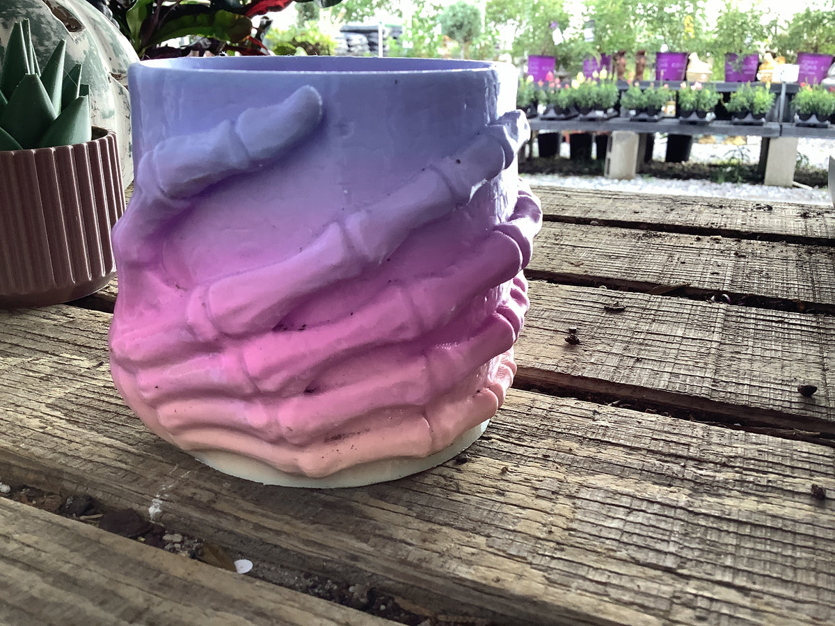 Rainbow skeleton hand planter
