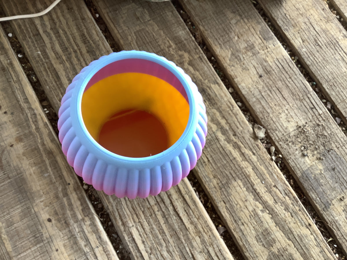 Multicolor planter with legs