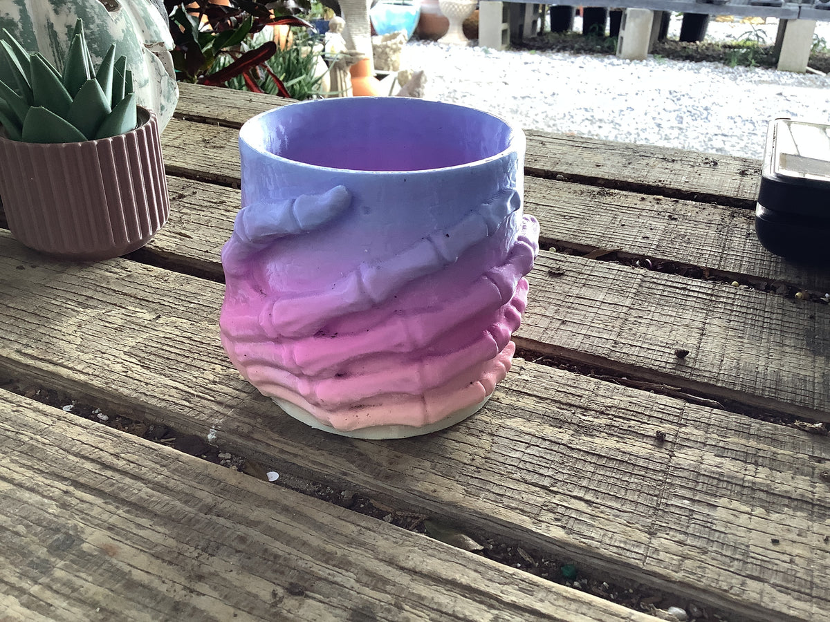 Rainbow skeleton hand planter