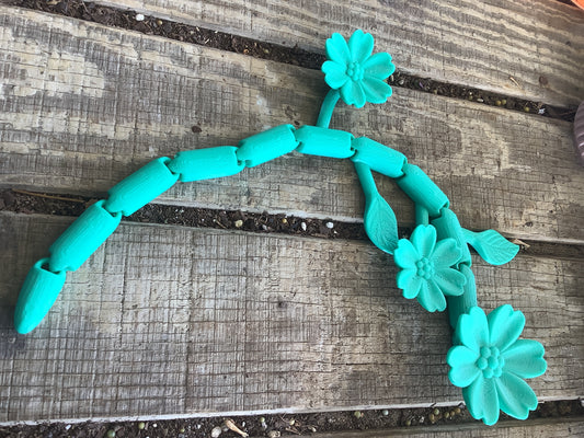 Articulated flower fidget